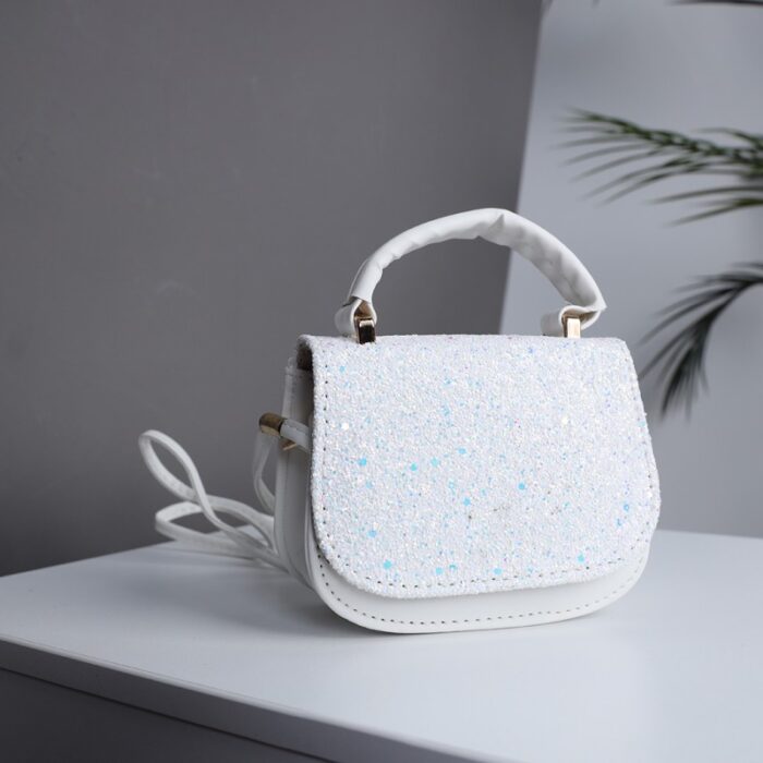 10333999_67dc476a20a79 حقيبة يد للاطفال لون ابيض - الصورة 1