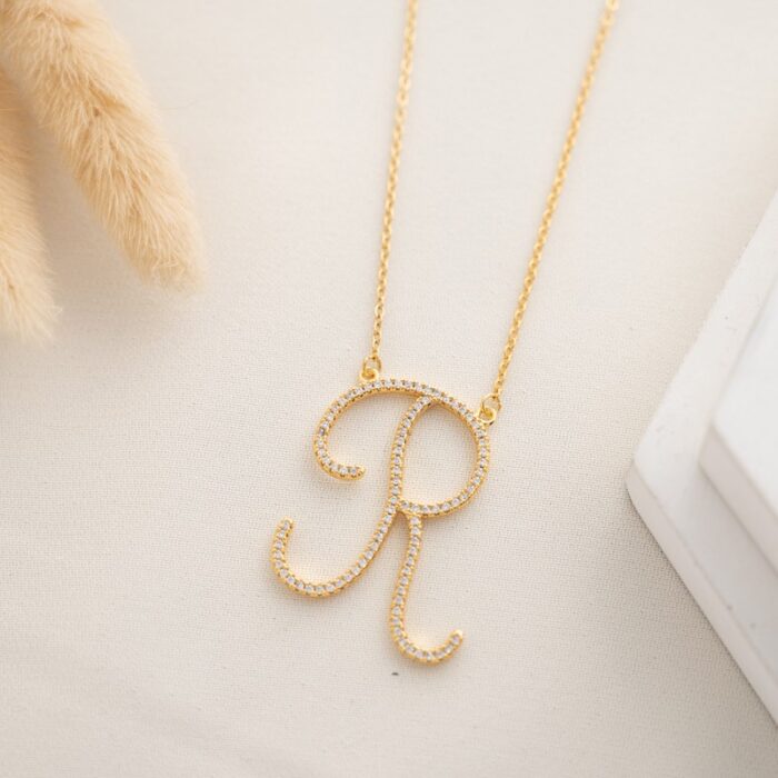 10334599_67dc4a93a57b7 سلسال ذهبي زركون بتصميم حرف R - الصورة 1