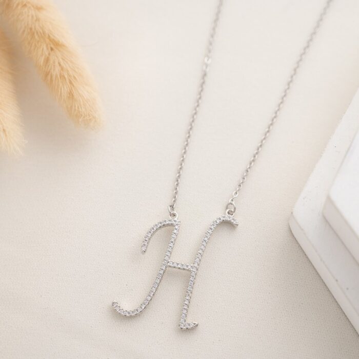 10334619_67dc4aa0ea76d سلسال فضي زركون بتصميم حرف H - الصورة 1