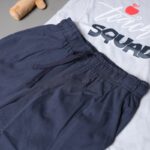 ⁦طقم قطعتين تيشيرت وشورت للأطفال لون سكني وكحلي⁩ - الصورة ⁦3⁩