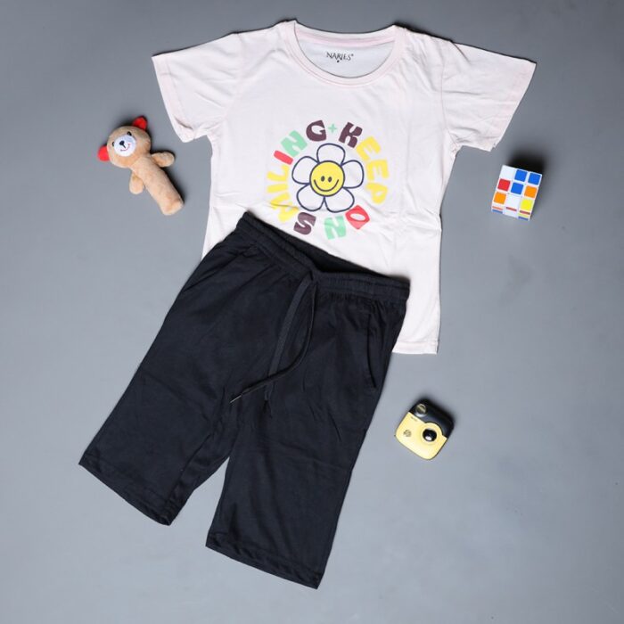 10334746_67dc4b79d1964 طقم قطعتين تيشيرت وشورت للأطفال لون زهري بارد وأسود - الصورة 1