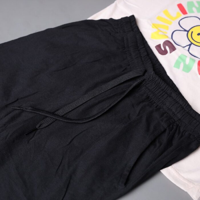 ⁦طقم قطعتين تيشيرت وشورت للأطفال لون زهري بارد وأسود⁩ - الصورة ⁦2⁩