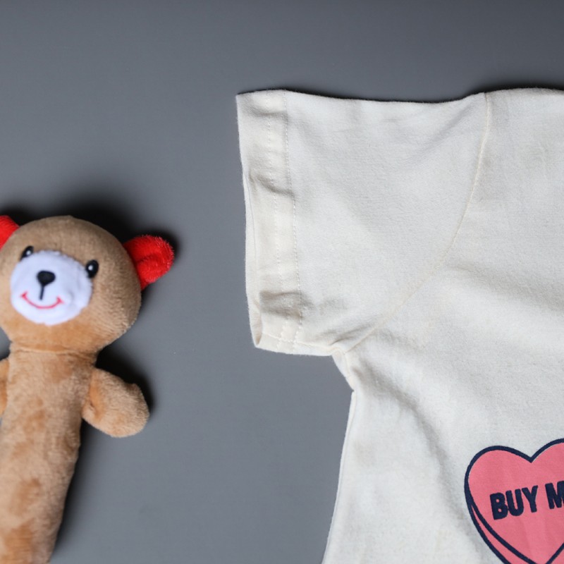 ⁦طقم قطعتين تيشيرت وشورت للأطفال لون أصفر بارد وزهري⁩ - الصورة ⁦1⁩