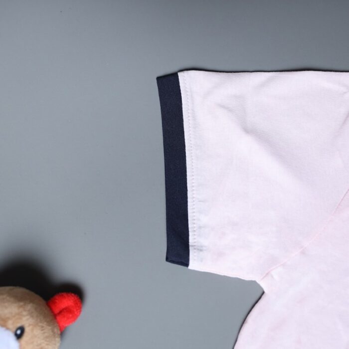 10334776_67dc4c42944a4 طقم قطعتين تيشيرت وشورت للأطفال لون زهري بارد وكحلي - الصورة 1