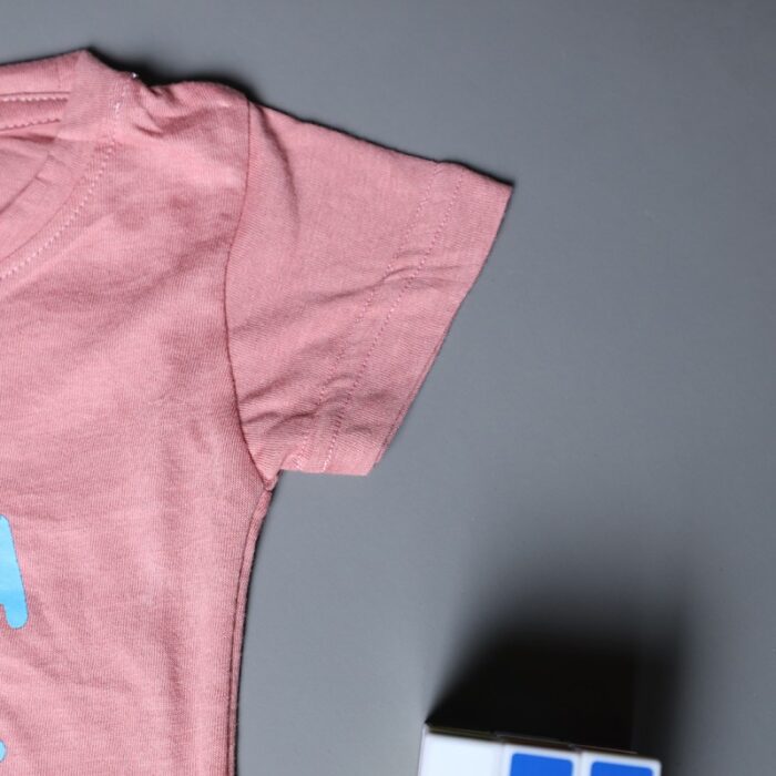 10334791_67dc4c6da64fe طقم قطعتين تيشيرت وشورت للأطفال لون نهدي وأسود - الصورة 1