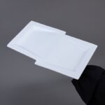 ⁦صحن بورسلان بتصميم شبه مستطيل حجم 32×19 سم لون أبيض⁩ - الصورة ⁦5⁩