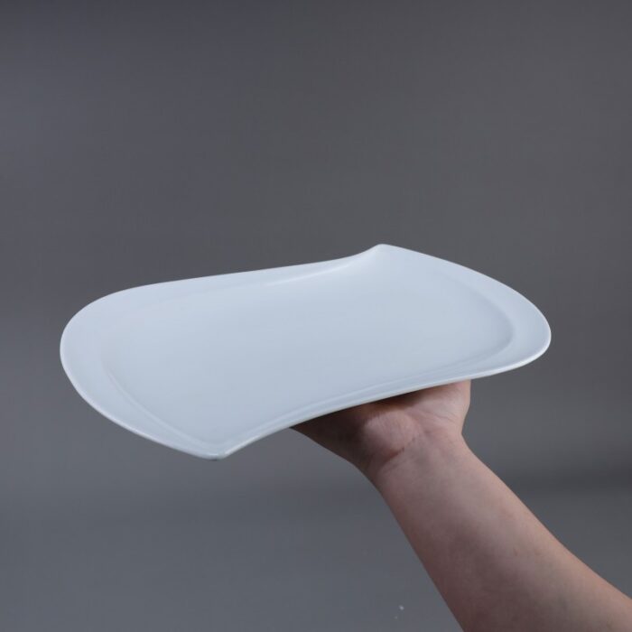 10334850_67dc4cc3b6a2a صحن بورسلان حجم 33×27 سم لون أبيض - الصورة 1