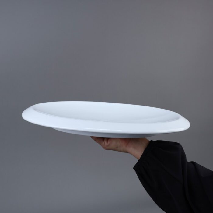 ⁦صحن بورسلان بتصميم بيضاوي حجم 35×27 سم لون أبيض⁩ - الصورة ⁦3⁩