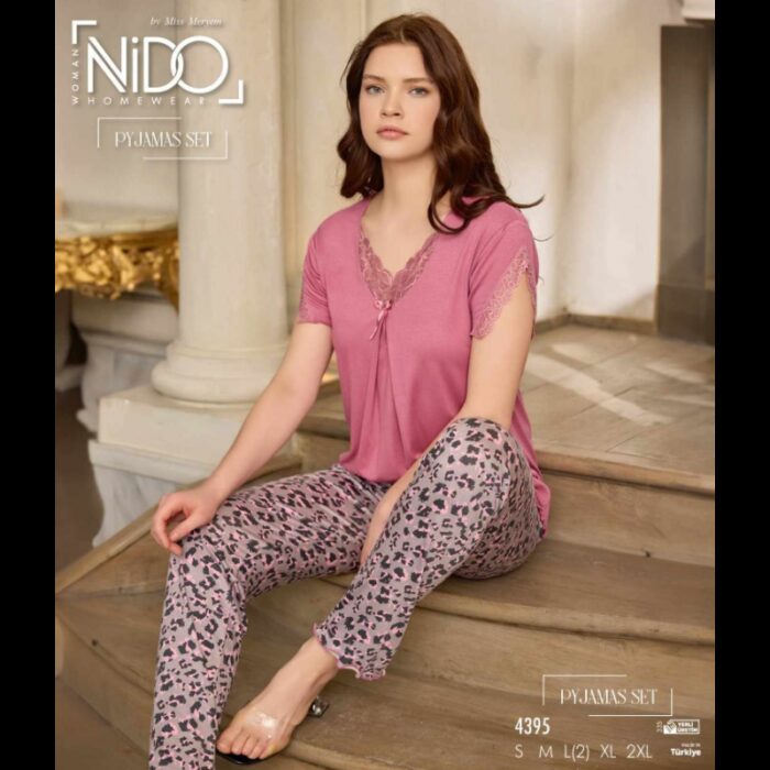 10335050_67dc4e3294f9c بيجامة بيتية قطعتين تيشيرت وبنطلون للنساء لون زهري وسكني - الصورة 1
