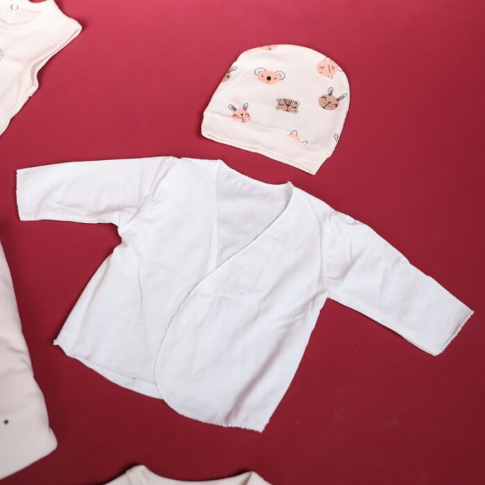 ⁦طقم للأطفال حديثي الولادة 10 قطع لون بيج⁩ - الصورة ⁦9⁩