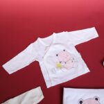 ⁦طقم للأطفال حديثي الولادة 10 قطع لون أبيض وزهري⁩ - الصورة ⁦11⁩