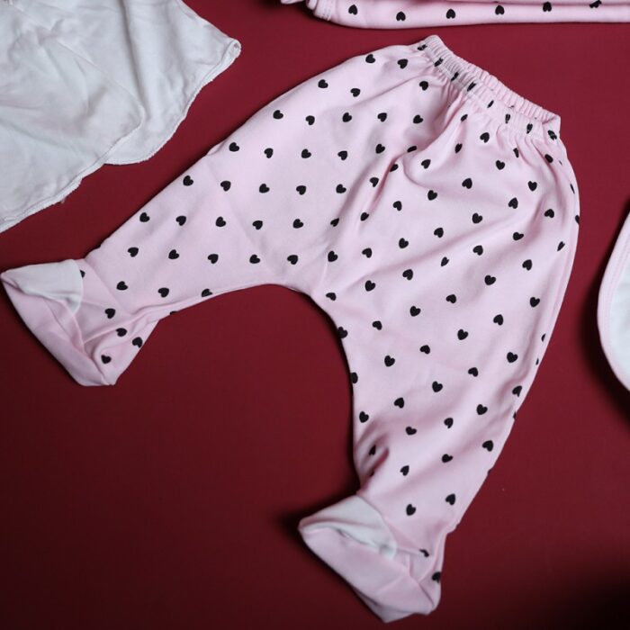 ⁦طقم للأطفال حديثي الولادة 10 قطع لون زهري و أبيض⁩ - الصورة ⁦10⁩