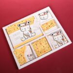 ⁦طقم للأطفال حديثي الولادة 10 قطع لون أصفر و أبيض⁩ - الصورة ⁦2⁩