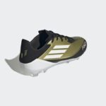 ⁦adidas Unisex' F50 League Messi Firm/Multi-Ground Soccer Cleats Boots - Gold - حذاء اديداس اف 50 ليجا ميسي فيرم ملتي جراوند للجنسين لون ذهبي وابيض⁩ - الصورة ⁦6⁩