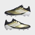 ⁦adidas Unisex' F50 League Messi Firm/Multi-Ground Soccer Cleats Boots - Gold - حذاء اديداس اف 50 ليجا ميسي فيرم ملتي جراوند للجنسين لون ذهبي وابيض⁩ - الصورة ⁦9⁩