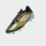 ⁦adidas Unisex' F50 League Messi Firm/Multi-Ground Soccer Cleats Boots - Gold - حذاء اديداس اف 50 ليجا ميسي فيرم ملتي جراوند للجنسين لون ذهبي وابيض⁩ - الصورة ⁦14⁩