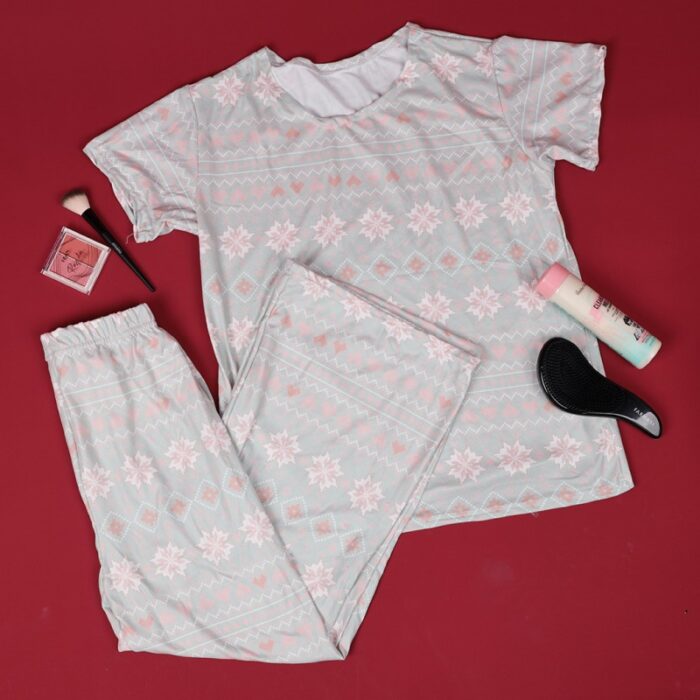 ⁦بجامة ستاتي بنقشه مكونه من قطعتين بنطلون وتيشيرت قطني لون فستقي ومشمشي⁩ - الصورة ⁦4⁩