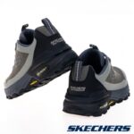 ⁦Skechers Men's Max Protect - Liberated Shoes - حذاء سكيتشرز ماكس بروتكت للرجال لون أسود وزيتي⁩ - الصورة ⁦9⁩