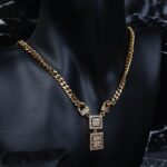 ⁦طقم اكسسوارات 4 قطع بتصميم جنزير وأحجار زركون لون ذهبي حجم 7⁩ - الصورة ⁦3⁩