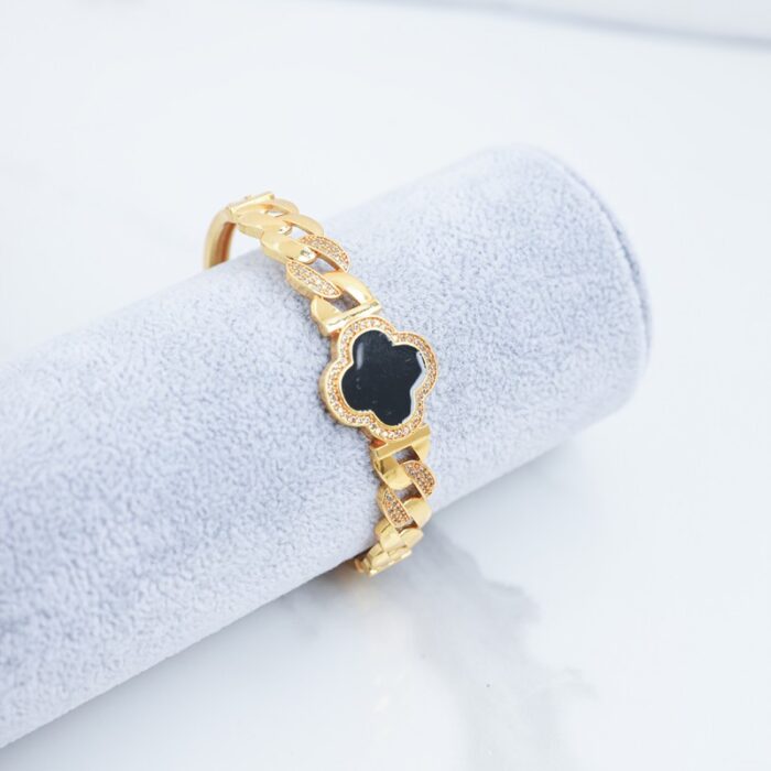 10336207_67dc56df42acc سوار ذهبي بتصميم وردة سوداء - الصورة 1