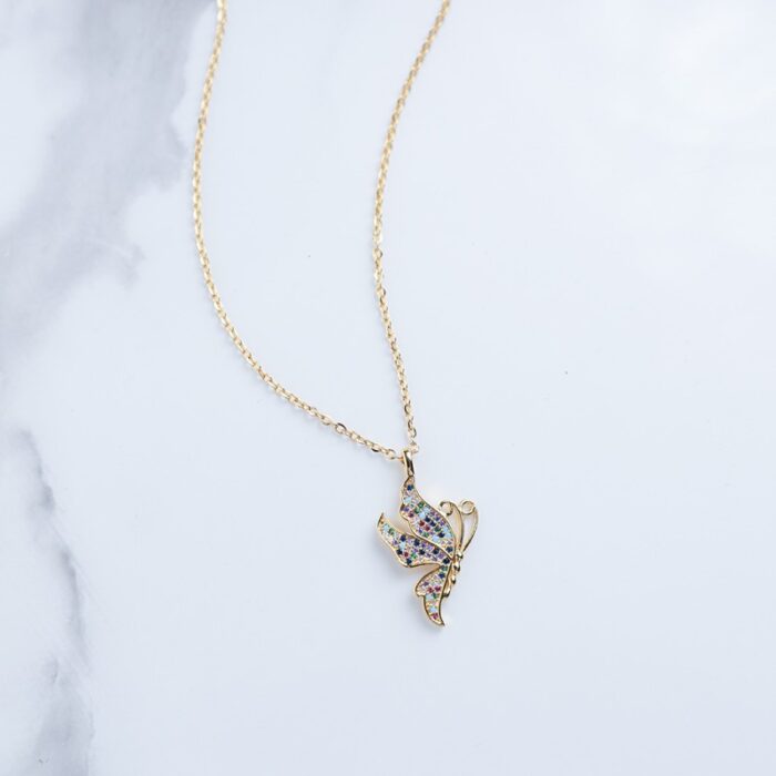 ⁦سلسال ذهبي بتصميم فراشة مع زركون ملون⁩ - الصورة ⁦2⁩