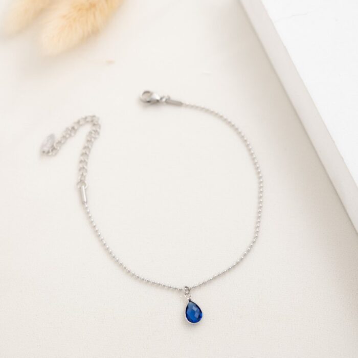 10336281_67dc572ac5abc خلخال فضي بتصميم دمعة زرقاء - الصورة 1