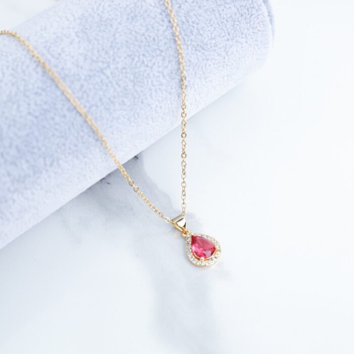 ⁦سلسال ذهبي بتصميم دمعة لون زهري⁩ - الصورة ⁦2⁩