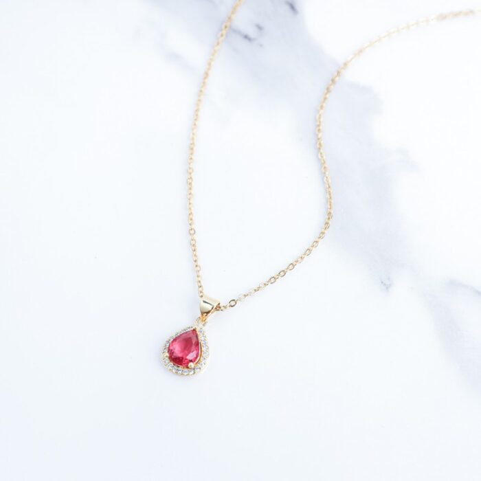 ⁦سلسال ذهبي بتصميم دمعة لون زهري⁩ - الصورة ⁦4⁩