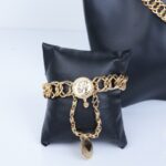 ⁦طقم اكسسورارت 4 قطع بتصميم جنزير وليرات لون ذهبي⁩ - الصورة ⁦2⁩