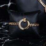 ⁦طقم اكسسوارات 4 قطع بتصميم دائري لون ذهبي حجم 10⁩ - الصورة ⁦3⁩