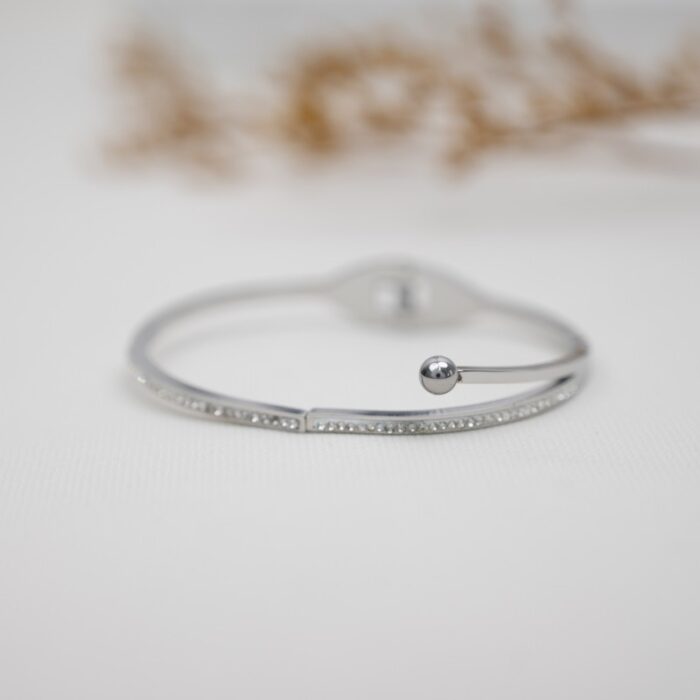 10336427_67dc58395b736 سوار فضي بتصميم زركون أبيض - الصورة 1