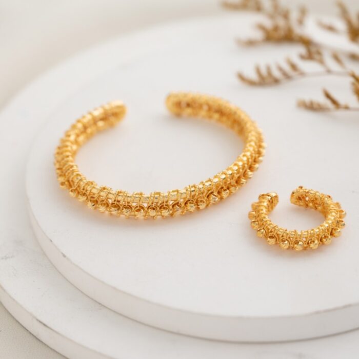 10336500_67dc587faf502 طقم قطعتين سوار مع خاتم لون ذهبي - الصورة 1
