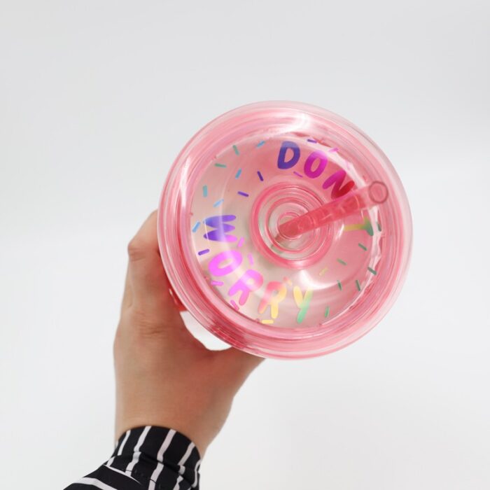 ⁦مطرة ماء مع مصاصة لون زهري بتصميم دونت⁩ - الصورة ⁦8⁩