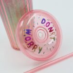 ⁦مطرة ماء مع مصاصة لون زهري بتصميم دونت⁩ - الصورة ⁦12⁩