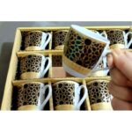 طقم فناجين قهوة عدد 12 لون أبيض بنقشة ذهبية وأسود سعة 120 مل