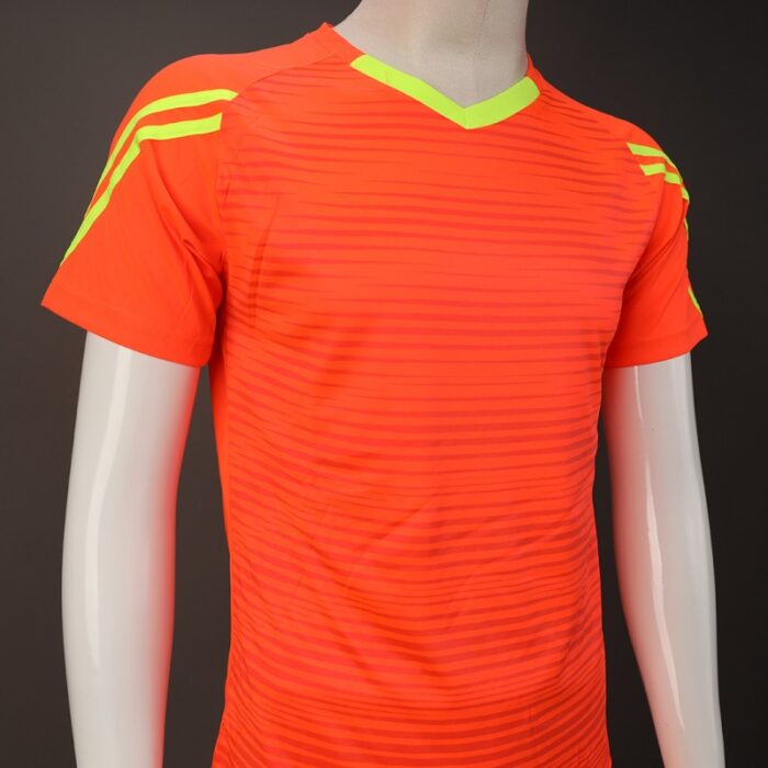 ⁦طقم رياضي (تيشيرت وشورت) للشباب لون برتقالي واصفر⁩ - الصورة ⁦5⁩