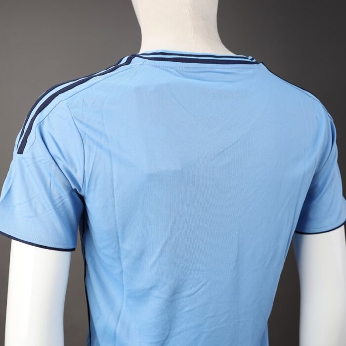 10337307_67dc5e717fe98 طقم رياضي (تيشيرت وشورت) للشباب لون كحلي وأسود - الصورة 1