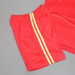 ⁦طقم رياضي (تيشيرت وشورت) للأطفال لون أحمر وأصفر⁩ - الصورة ⁦4⁩