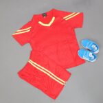 ⁦طقم رياضي (تيشيرت وشورت) للأطفال لون أحمر وأصفر⁩ - الصورة ⁦9⁩