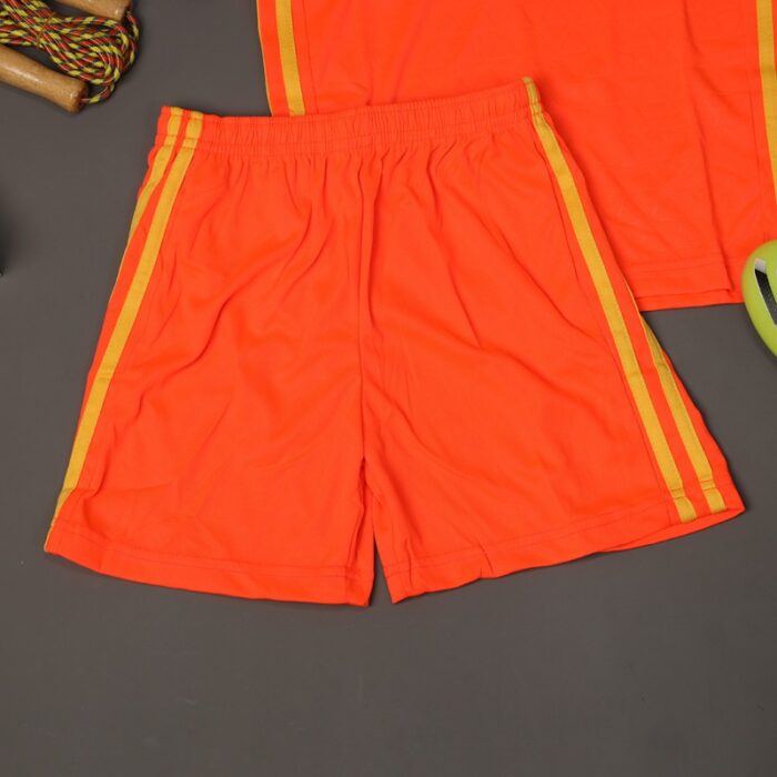 ⁦طقم رياضي (تيشيرت وشورت) للأطفال لون برتقالي وأصفر⁩ - الصورة ⁦9⁩