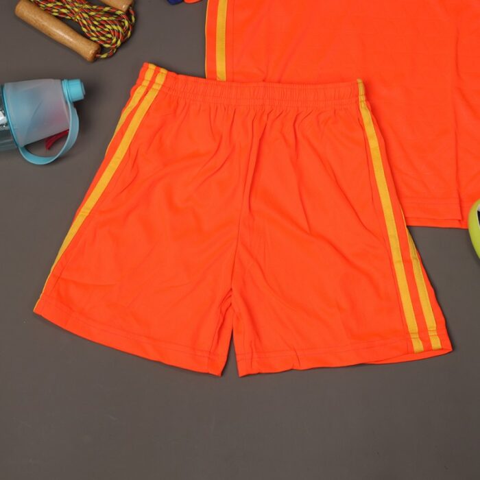⁦طقم رياضي (تيشيرت وشورت) للأطفال لون برتقالي وأصفر⁩ - الصورة ⁦12⁩