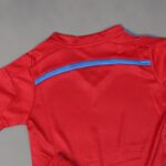 طقم رياضي (تيشيرت وشورت) للأطفال لون خمري وأصفر فسفوري