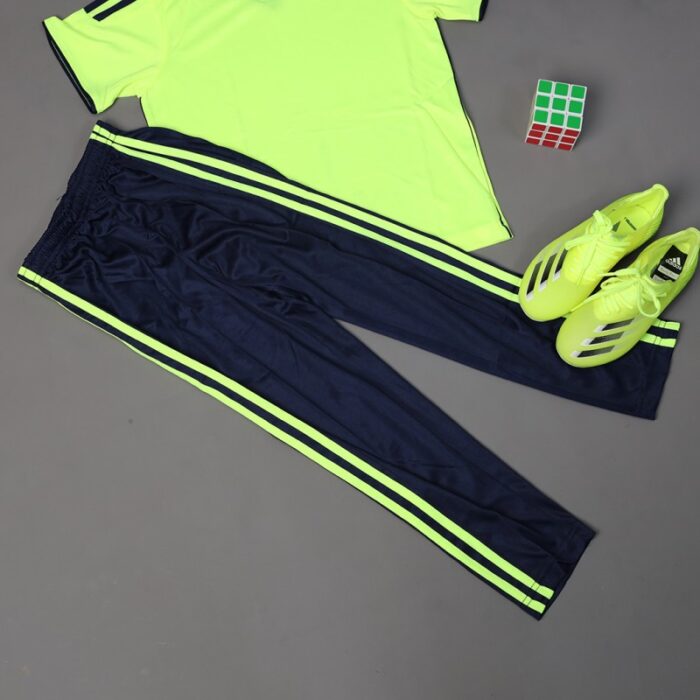 ⁦طقم رياضي (تيشيرت وبنطلون) للأطفال لون أصفر وأسود⁩ - الصورة ⁦6⁩