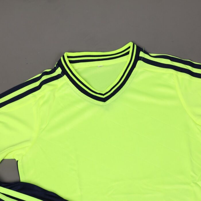 ⁦طقم رياضي (تيشيرت وبنطلون) للأطفال لون أصفر وأسود⁩ - الصورة ⁦9⁩