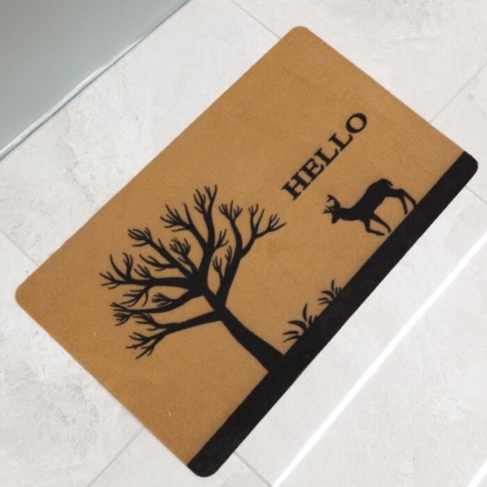 103374562_67dc607b6115b سجادة أرضية (دعسة المداخل) قماشية بتصميم مستطيل مع طباعة غزال وشجرة حجم 70×40 سم لون عسلي وأسود - الصورة 1