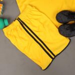 ⁦طقم رياضي (تيشيرت وشورت) للأطفال لون أصفر⁩ - الصورة ⁦8⁩