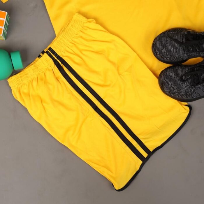 ⁦طقم رياضي (تيشيرت وشورت) للأطفال لون أصفر⁩ - الصورة ⁦8⁩