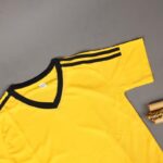 ⁦طقم رياضي (تيشيرت وشورت) للأطفال لون أصفر⁩ - الصورة ⁦9⁩