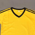 ⁦طقم رياضي (تيشيرت وشورت) للأطفال لون أصفر⁩ - الصورة ⁦12⁩