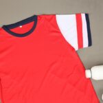 ⁦طقم رياضي (تيشيرت وشورت) للأطفال لون أحمر وكحلي⁩ - الصورة ⁦12⁩